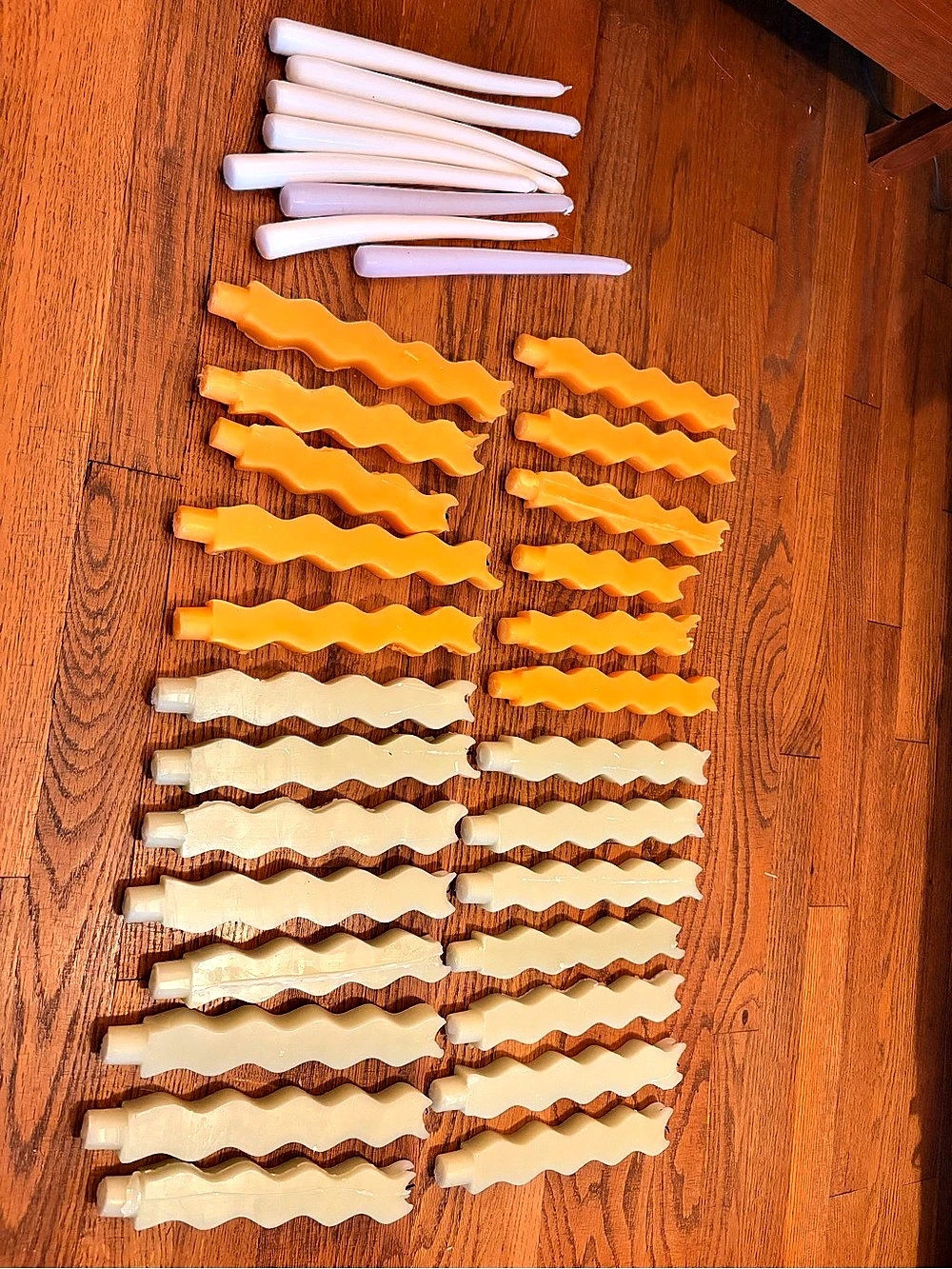 White, Orange, and Green Taper Candles